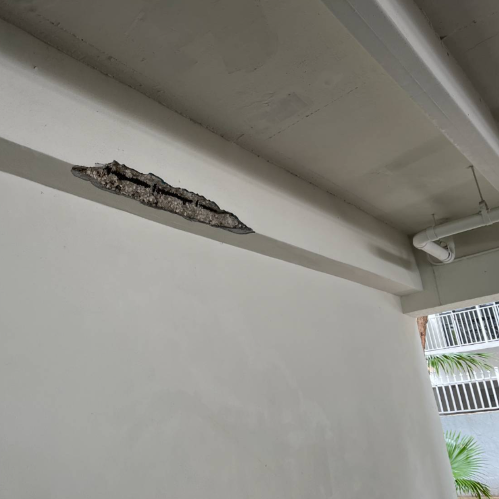 Exposed rebar and concrete spalling